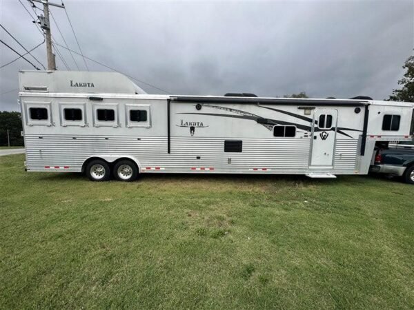 2014 Lakota Bighorn 8416, Generator, Couch, Dinette 17’ Shortwall, 4 Horse Trailer, 12' Slide.