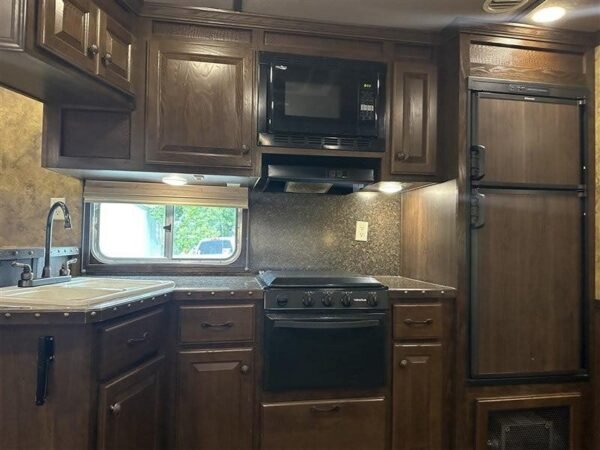2014 Lakota Bighorn 8416, Generator, Couch, Dinette 17’ Shortwall, 4 Horse Trailer, 12' Slide. - Image 26